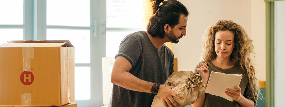 tenants packing things in boxes