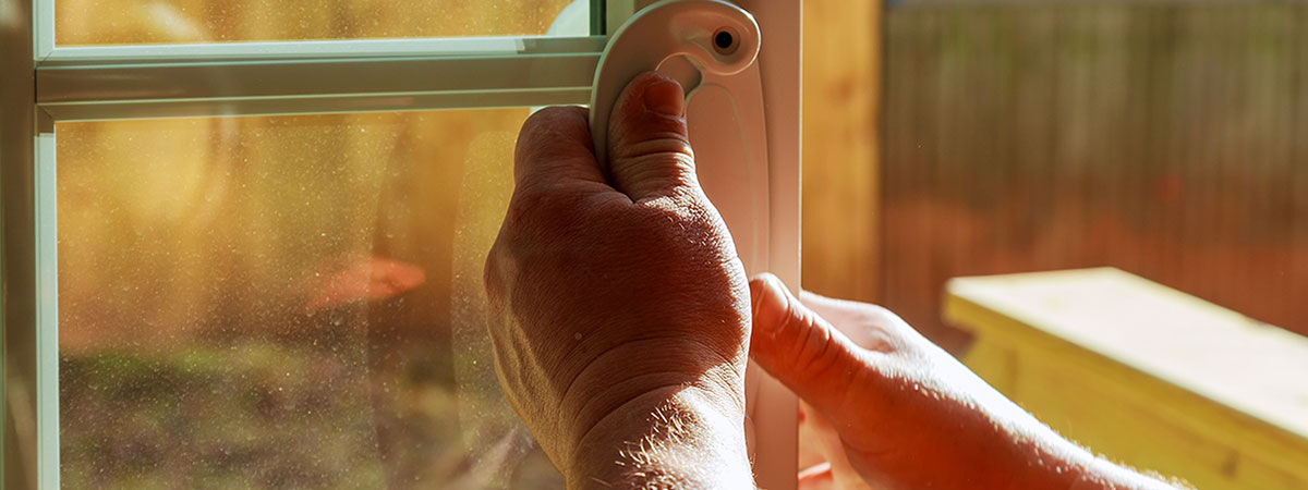 man shutting window at the end of tenancy