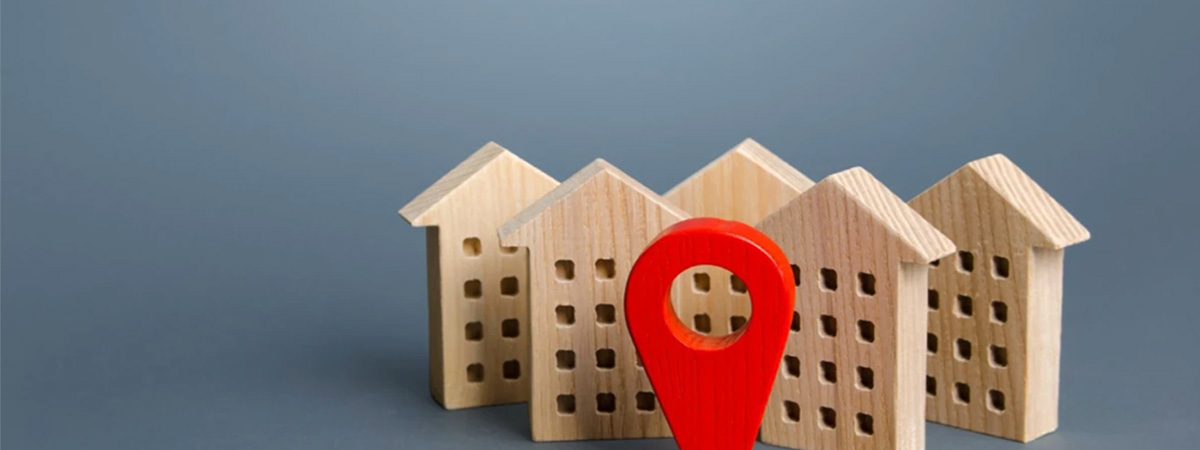 A location pin shows the location of buy to let houses