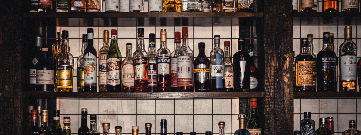 A new London bar with wire racks of alcohol opened in March 2023