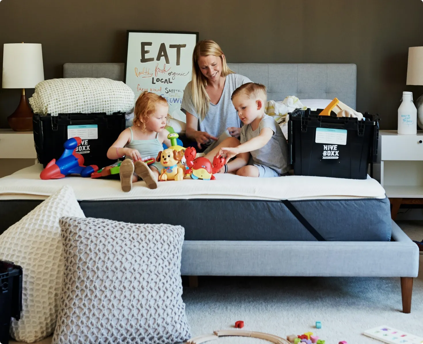Letting agent showing tenants around a modern flat in London