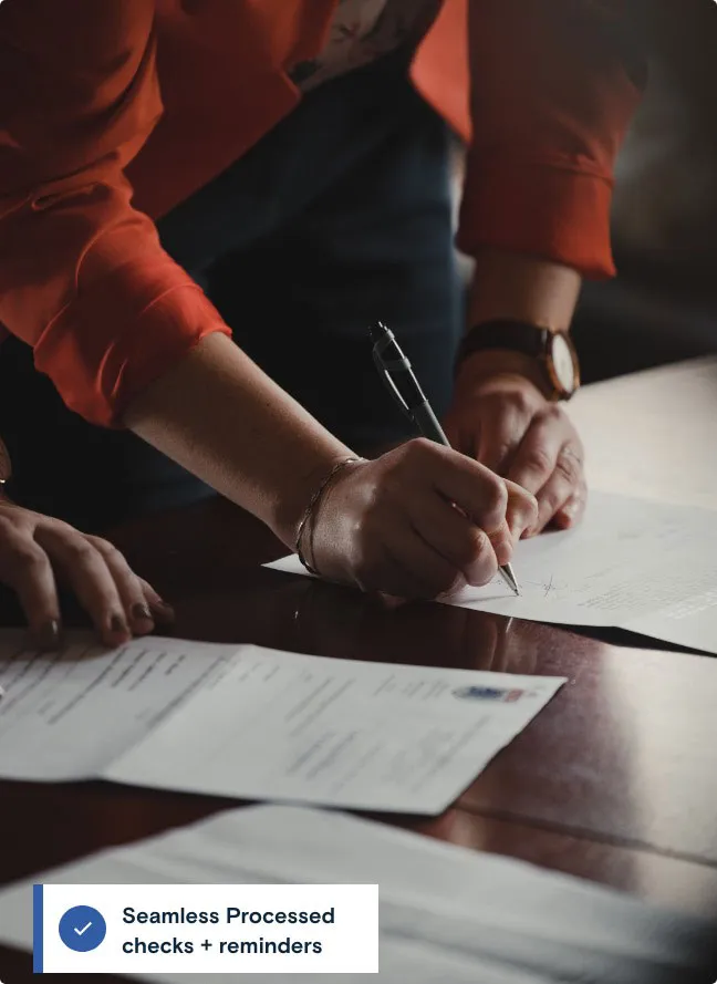 person signing their rental property contract