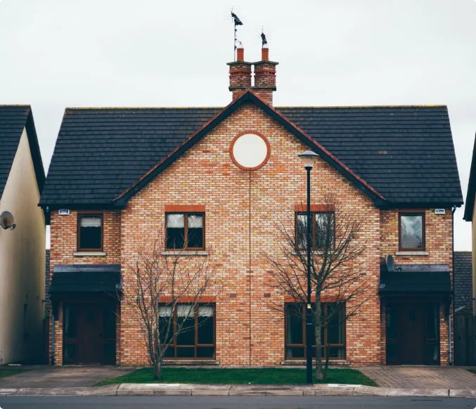 Letting agent showing tenants around a modern flat in London
