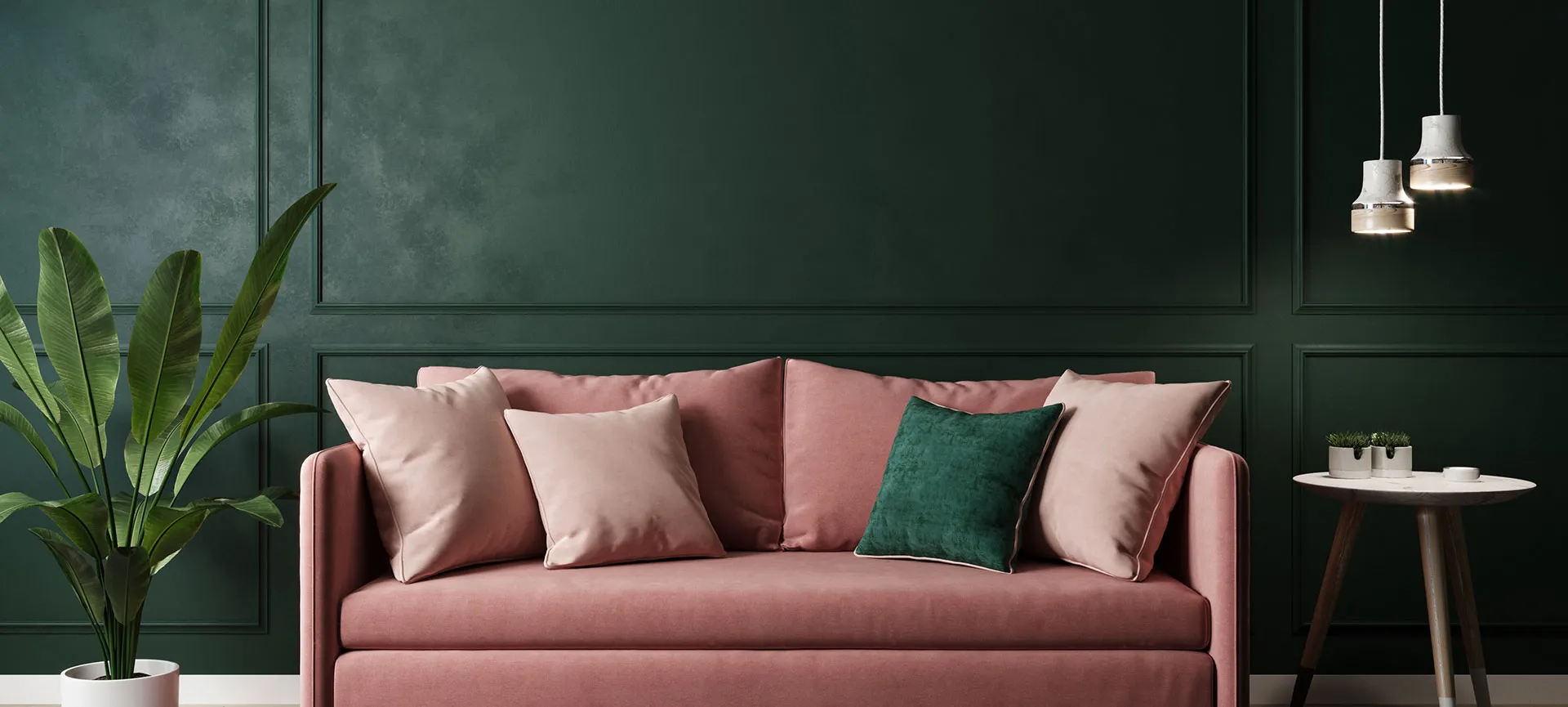 a crushed velvet sofa set against a dark green wall in a beautiful apartment in London